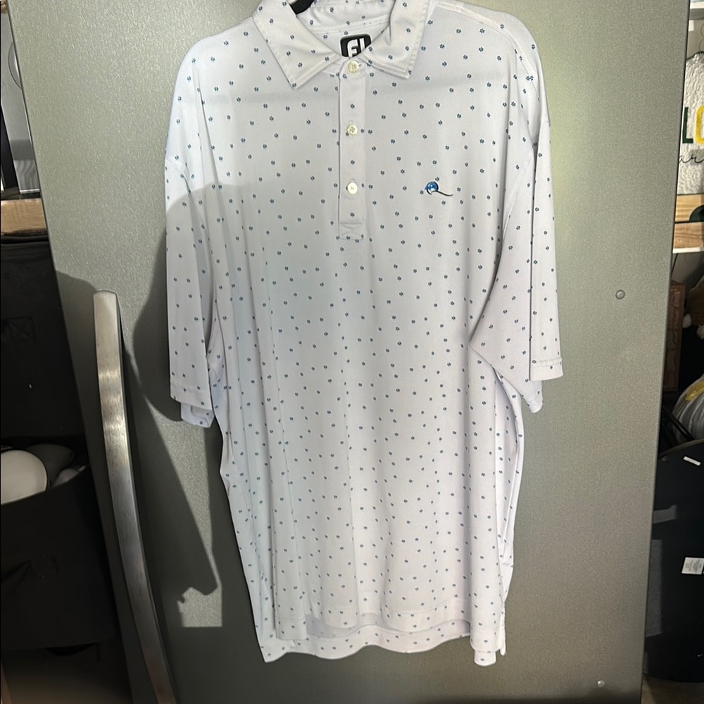 Stylish White Polo Shirt with Blue Dots